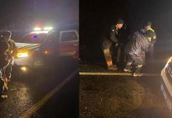 Uygulama yapan jandarma, otomobilde fenalaşan kadını hastaneye yetiştirdi