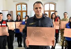 Pençe Kilit şehitlerinin isimleri ay-yıldızlı rölyeflere işlendi