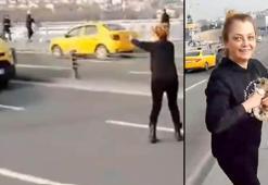 Yavru kediyi kurtarmak için trafiği durdurdu
