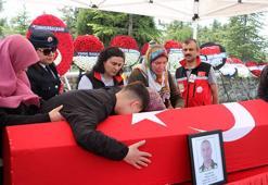 Şehit polis son yolculuğuna uğurlandı; oğlu tabutuna sarılıp gözyaşı döktü