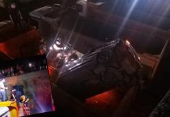 Otomobil, park halindeki kamyonun damperine düştü: 1 yaralı