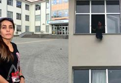 Taşınması kararı alınan okulda, pencereye çıkıp atlamaya kalkıştı