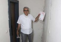 Aldığı dairenin kapısına duvar örüp, saldırıda bulundular