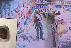 Duvarını balyozla kırdığı marketi soydu, yorulunca meyve suyu içip dinlendi