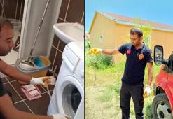Öğretim görevlisinin çamaşır makinesine giren yılanı, itfaiye ekibi çıkardı