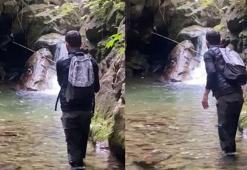 Balık tutarken ayıyla karşılaştılar; o anlar kamerada