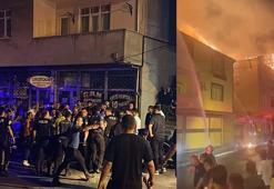 Sancaktepe'de, evini ateşe veren şüpheliyi, mahallelinin elinden polis zor kurtardı