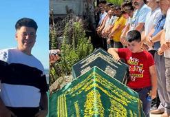 Elinde oyuncağı, ağabeyinin tabutunun başında gözyaşı döktü