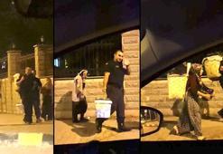 Jandarmalar, yüklerini taşımakta zorlanan kadınlara yardım etti