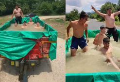 Traktör römorkunu havuza çevirip serinlediler; o anlar kamerada
