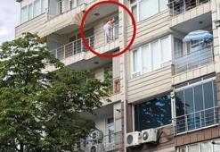 4'üncü kattaki evinin balkonunda atlamaya kalkışan kadını ekipler ikna etti