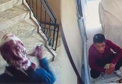 Kadın kıyafetleri giyen hırsız, önce kameraya ardından polise yakalandı