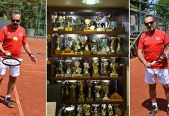 66 yaşındaki milli tenisçi çektiği fotoğraflarla Guiness'e girmeye hazırlanıyor