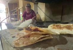 Hasta oğlu ve torunları için günde bin tandır ekmeği pişiriyor