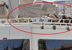 Minibüsün tavanında tehlikeli yolculuk kamerada