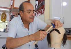 Eski opera makyörü garajda sanatını sürdürüyor