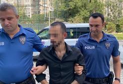Boşanma aşamasındaki eşine silah çekince gözaltına alındı
