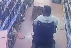 Akülü sandalye ile geldiği markette engelli gibi davranıp, hırsızlık yaptı; o anlar kamerada