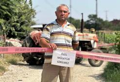 Tapulu arazisindeki yola 'özel mülk' yazısı asıp, ulaşıma kapattı