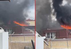 Sancaktepe'de 3 katlı binanın çatı katı yandı; 2 itfaiye eri yaralandı