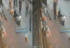 Fatih'te kaldırımda arkadaşıyla sohbet ederken üzerine cam çerçeve düştü