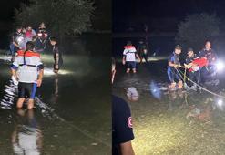 Uyuyunca şelaledeki adacıkta mahsur kalan aile, suyun kesilmesiyle kurtarıldı