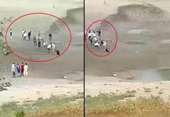 Bataklığa saplanan 3 çocuk, insan zinciri ile kurtarıldı; o anlar kamerada