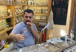 Cama üfleyerek şekil veriyor