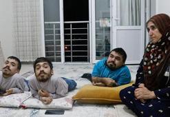 Kemik erimesi hastası 3 çocuğunu, her gün sırtında 4 kat indirip çıkarıyor