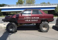 1995 model otomobilini off-road aracına çevirdi