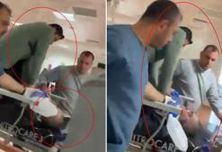 Kalp krizi geçiren hastaya sedye üzerinde doktordan hayat kurtaran müdahale