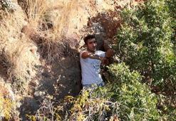 2 kişiyi kovalarken falezlerde kayalıklardan düşüp, mahsur kaldı