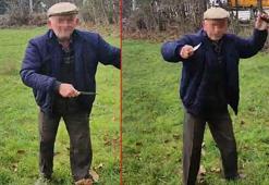 Köpekler için boş araziye koyulan kulübeyi ateşe verdi, tepki gösteren kişiye bıçak çekti