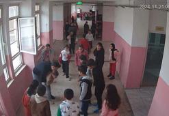 Boğazına şeker kaçan öğrencisini Heimlich manevrası ile kurtardı; o anlar kamerada