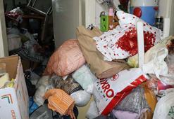 Nazilli'de koku ihbarı üzerine temizlenen evden 4 kamyon çöp çıktı