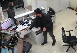 Döviz bürosu soyguncusu, iş yeri sahibini güvenli şekilde uzaklaşmak için rehin almış