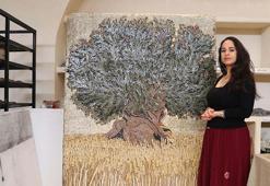 Hatay’da enkaz altından çıkarılan 500 bin parçalı mozaik sanat eseri, İzmir'de sergileniyor