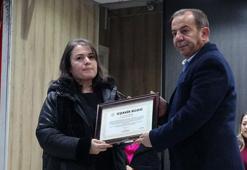 Tanju Özcan'dan, otel yangını soruşturmasında tutuklanan belediye personeli ile itfaiyecilere hizmet şeref belgesi