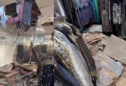 Küçükçekmece'de yıkımı yapılan binadan kopan parçalar yanındaki mağazanın tavanını delerek içeri düştü