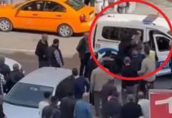 Kendisine tacizde bulunduğunu iddia ettiği şüpheliyi polise teslim etti