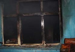 Misafirliğe gittiği evde çıkan yangın sırasında kalp krizinden öldü