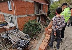 Park etmek istediği otomobille bahçeye düştü