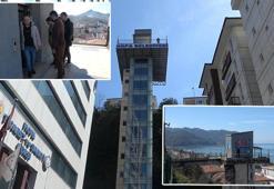 Sarp arazide kurulan 'asansör' ile evlerine ulaşıyorlar