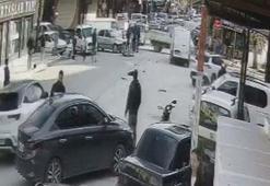 Bursa'da otomobil ile motosikletin çarpışması kamerada; 2 yaralı