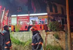 Evde çıkan yangında yatalak kadını komşuları kurtardı