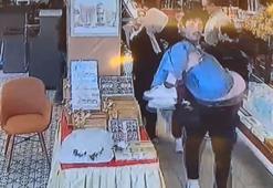 Depremde canını hiçe sayıp bayılan müşteriyi kurtardı