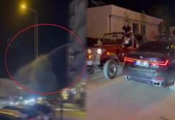 Yüksek sesle müzik açan sürücülerin araçlarına balkondan hortumla su sıktı