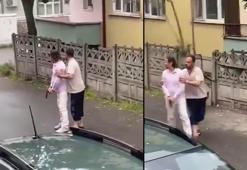Egzoz sesinden rahatsız olup tabanca ve balyozla dışarı çıkan 2 kişiyi komşuları sakinleştirdi