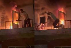 Yangına müdahale ederken alevler büyüyünce balkondan atladı