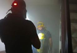 Siirt'te polis lojmanında çıkan yangında 13 kişi dumandan etkilendi